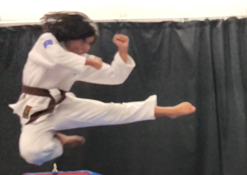 Children practicing martial arts together at US Bushido