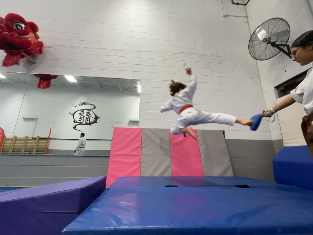 Kids self defense class practicing with partners in Gaithersburg